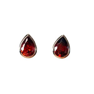 Red teardrop ruby stud